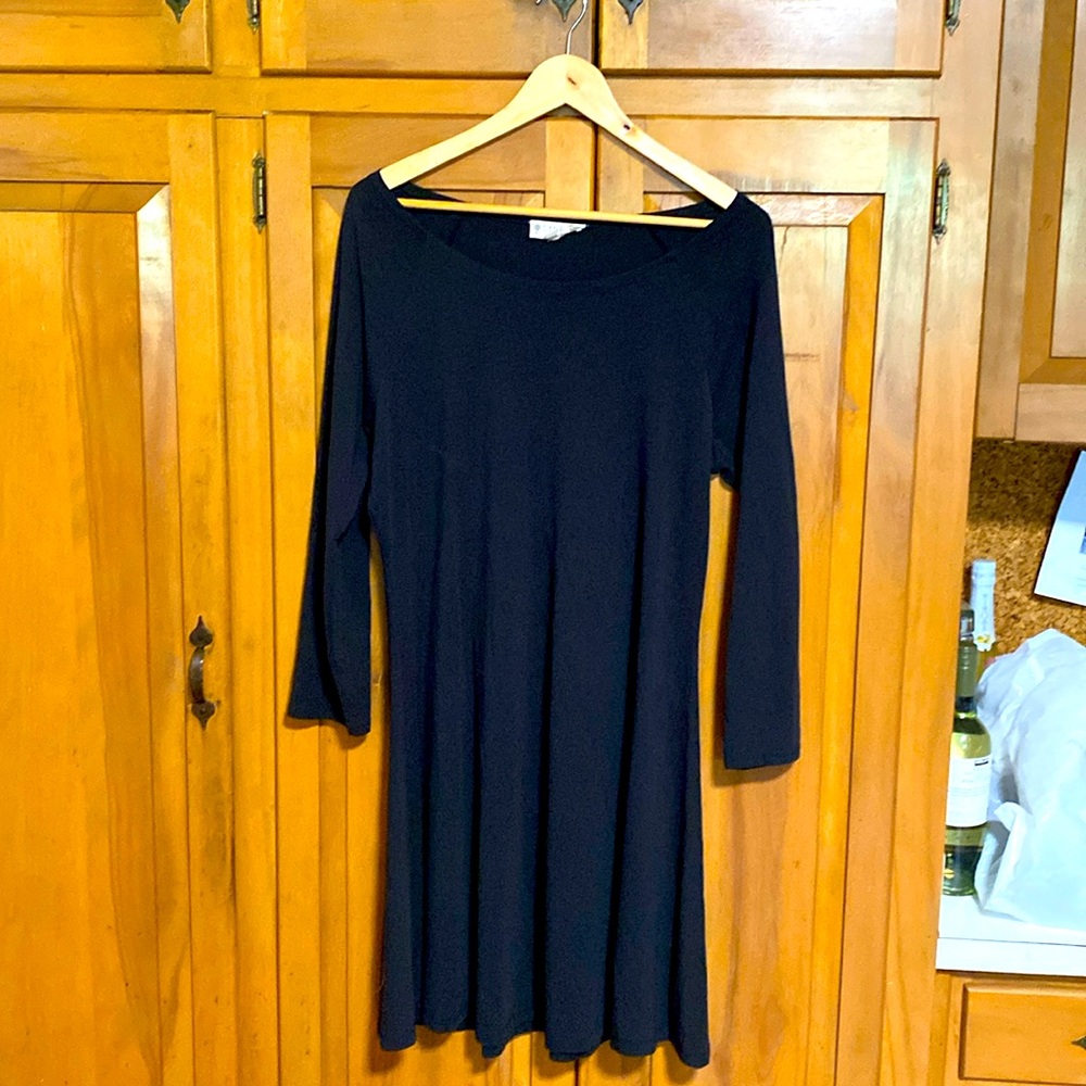 33-34 inch length with long sleeves that can be pushed up